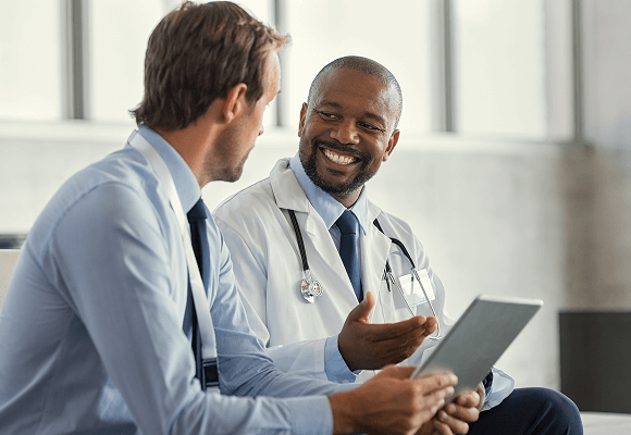 Two doctors talking to each other