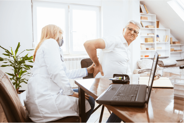 Doctor examining patients back pain