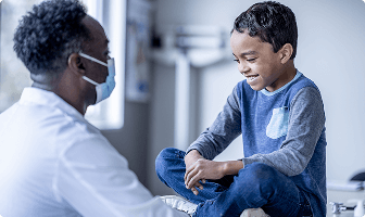 Doctor talking with a boy