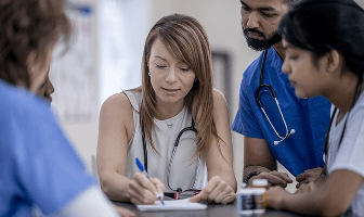 Group of doctors consulting each other