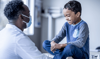 Doctor talking with a boy
