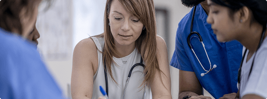 Group of doctors consulting each other