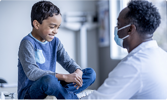 Doctor talking with a boy